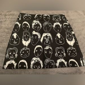 Black and White face skirt. Size Medium and from Shekou.